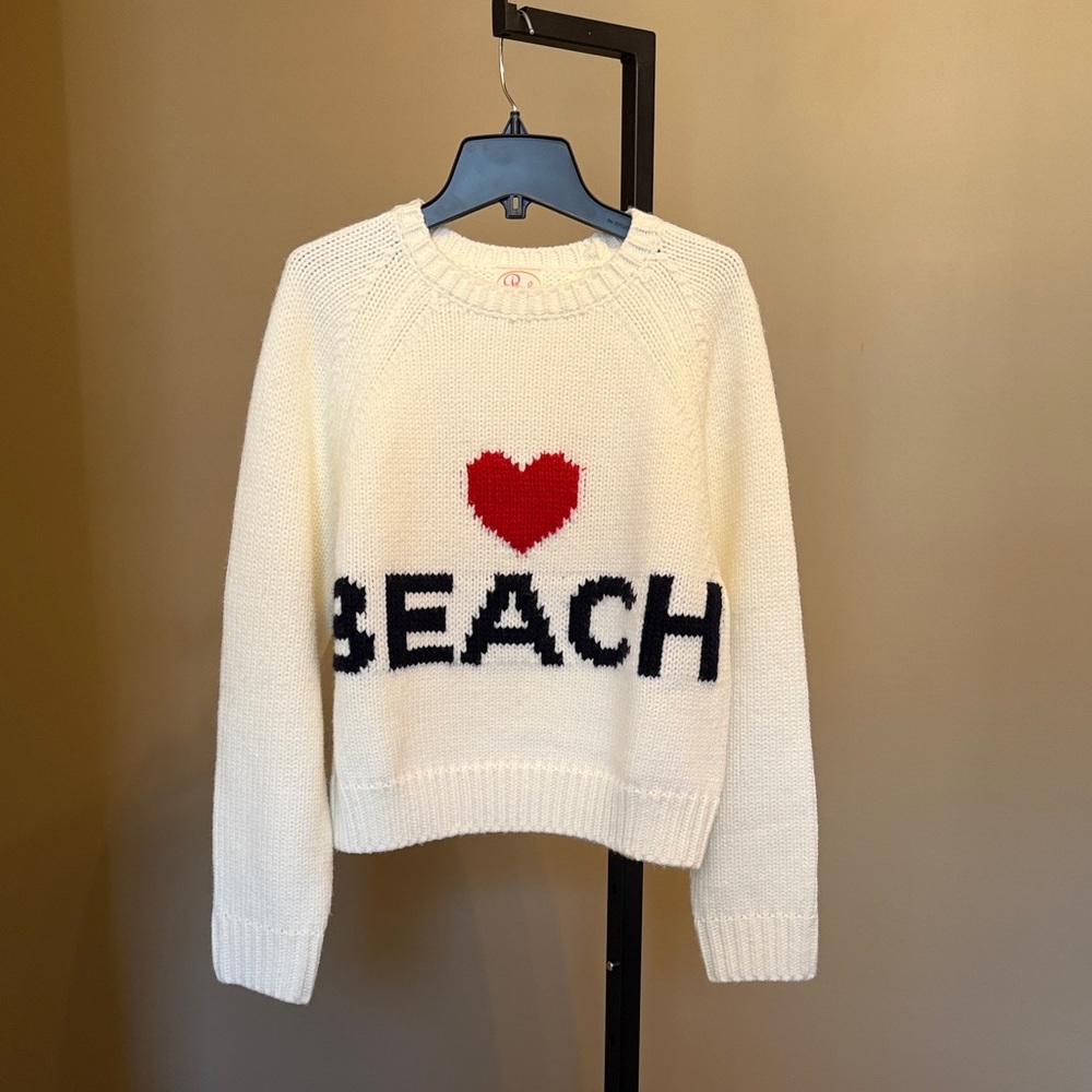 Pink Pineapple Beach sweater .  Never worn.  Cropped style.